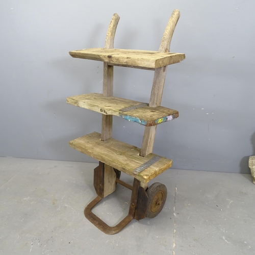 3288 - A three-tier plant stand converted from a sack barrow. 60x107x23cm.