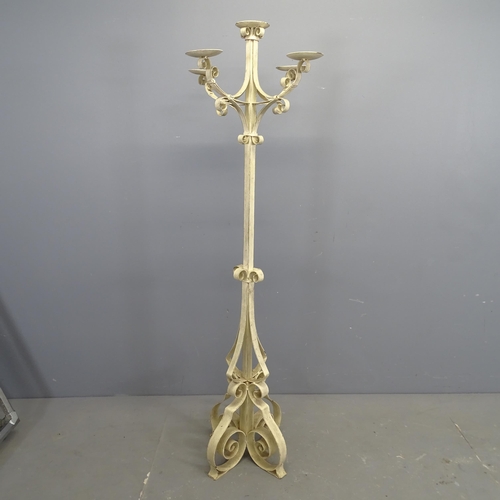 3291 - A painted wrought metal floor standing candelabra. Height 150cm.