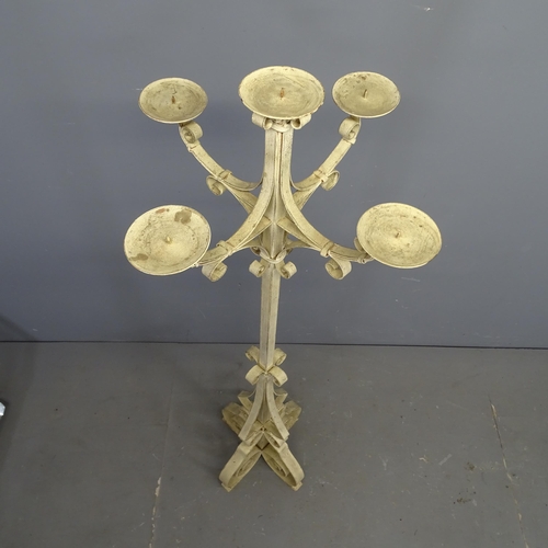 3291 - A painted wrought metal floor standing candelabra. Height 150cm.