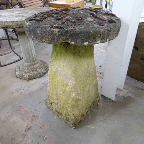 3294 - A weathered concrete Staddle stone on stand. 55x78cm.