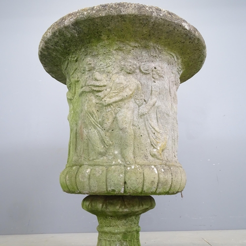 3295 - A weathered concrete Grecian design two-section garden urn. 64x85cm.