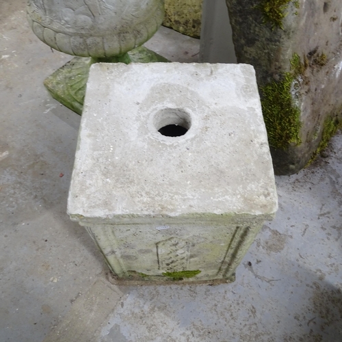 3297 - A weathered concrete continental style square plinth. 35x51cm.