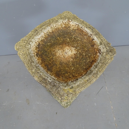 3317 - A weathered concrete two-section bird bath. 36x72cm.