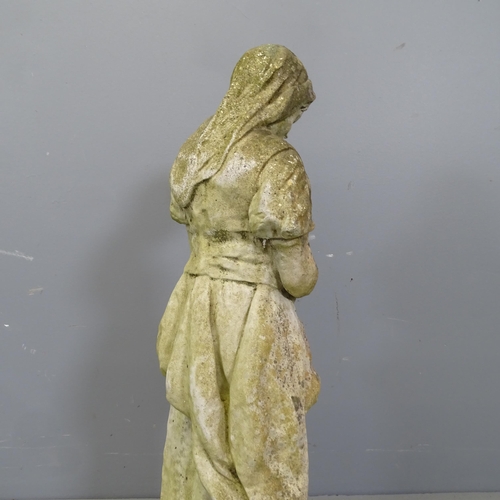 3321 - A weathered concrete garden statue, study of a woman holding a wheatsheaf. Height 72cm.