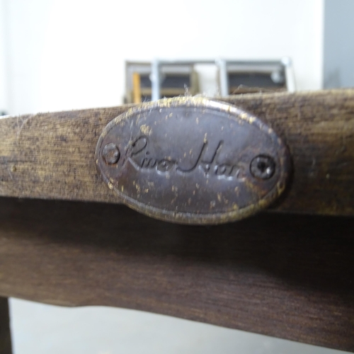 3325 - A teak slatted garden table, with label for River Han. 110x46x50cm.