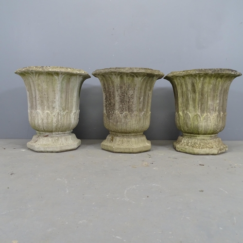 3345 - Three matching octagonal concrete garden urns , impressed HGC. 40x46cm.