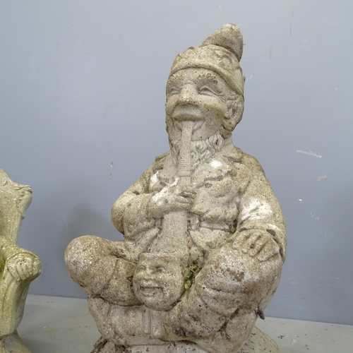 3354 - Two various weathered concrete garden gnomes. Tallest 58cm.