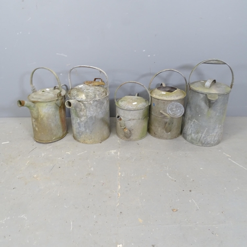 3361 - Five galvanised metal watering cans. Tallest 52cm.