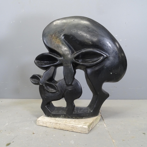 3373 - A hand carved hardstone sculpture, study of an Impala mother and baby. Height 50cm.