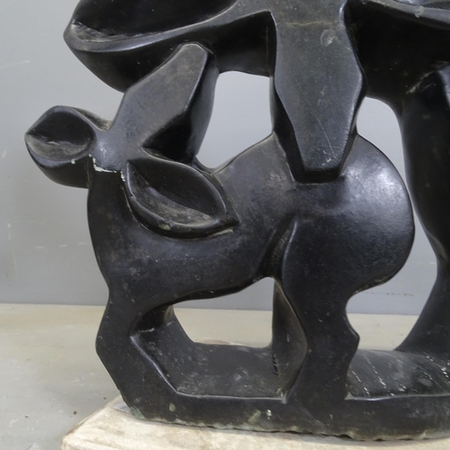 3373 - A hand carved hardstone sculpture, study of an Impala mother and baby. Height 50cm.