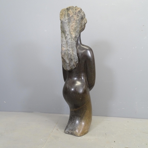 3374 - ZINYEKA - a hand carved hardstone sculpture, abstract study of a figure, signed. Height 77cm.... 