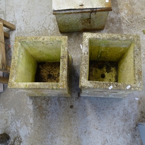 3385 - A pair of square stone planters, with swag and urn decoration. 38x43cm.