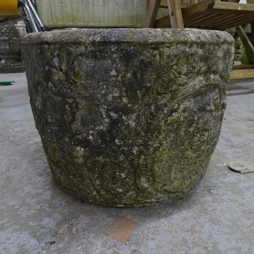 3390 - A weathered concrete circular planter. 38x28cm.