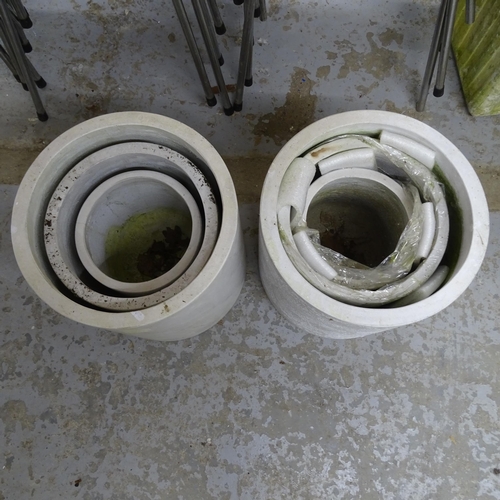 3391 - Two sets of three graduated reconstituted marble garden pots. Largest 37x37cm.