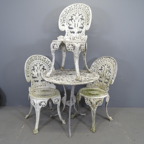 3393 - A painted metal circular garden table, 69x64cm, and three similar chairs.