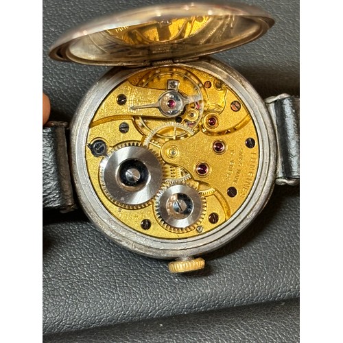 1024 - LONGINES - an early 20th century sterling silver Officer's style trench mechanical wristwatch, circa... 