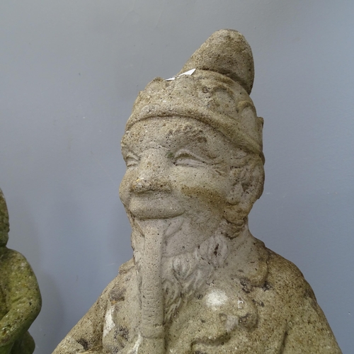 3354 - Two various weathered concrete garden gnomes. Tallest 58cm.