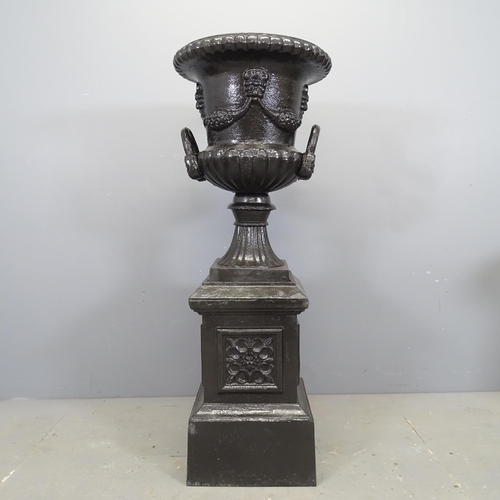 3397 - A 19th century painted two-section cast iron Medici style urn. 45x116cm.