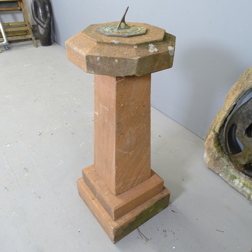 3398 - A four-section sandstone sun dial. 31x81cm.