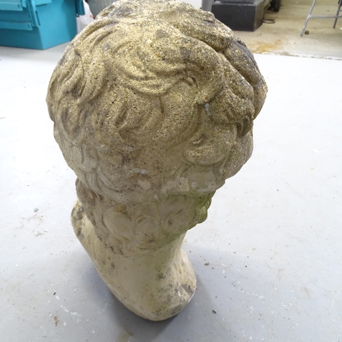 3403 - A weathered concrete bust, study of Michelangelo's David. Height 42cm.