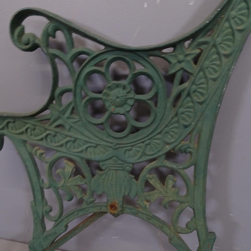 3417 - A pair of painted cast iron garden bench ends. 60x72cm.