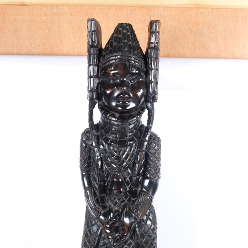 117 - PNG - A large carved hardwood study of a Tribal figure, H91cm