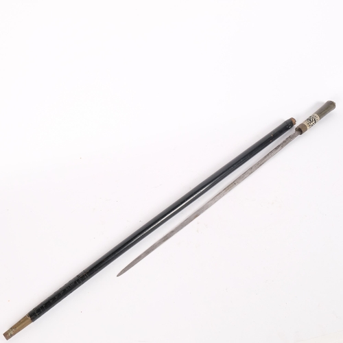 12 - An Antique Anglo-Indian ebonised swordstick with carved horn handle, L92cm, blade length 55cm