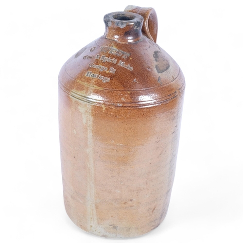 14 - A large Victorian stoneware flagon, named to C West, Wine & Spirit Merchants, George Street Hastings... 