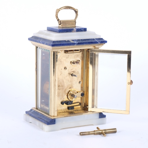 16 - HANLEY, ENGLAND - an alabaster and lapis lazuli carriage clock, with gilt-brass columns, height not ... 