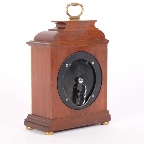 17 - GARRARD & COMPANY LTD LONDON - an Elliot mahogany-cased mantel clock, height not including handle 19... 