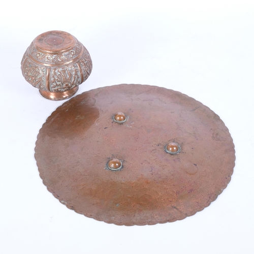 32 - A Persian silver overlay charger, diameter 25cm, together with a small Thai repousse bronze pot (2)