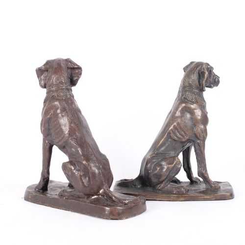 33 - A pair of patinated cast-bronze hunting dogs, seated position on naturalistic base, H23cm