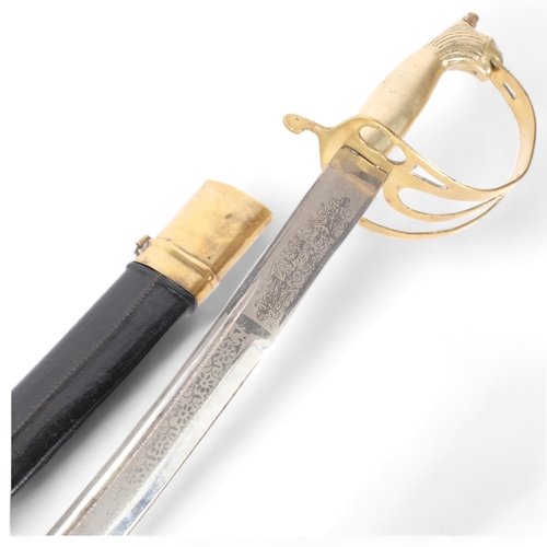 62 - An Indian ceremonial dress sword, with engraved steel blade and brass-bound scabbard, L96cm, blade l... 