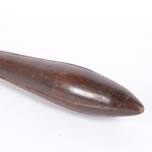 66 - An Australian Aboriginal club, length 71cm