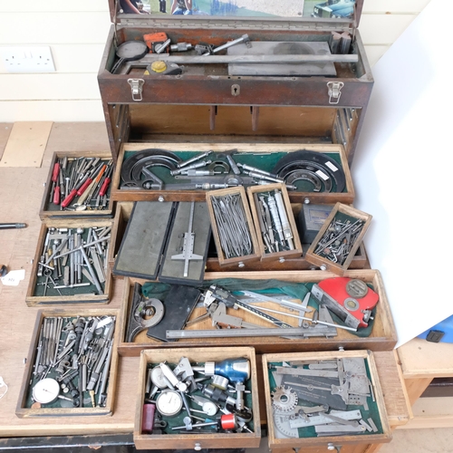 71 - A 20th century stained wood engineer's cabinet and associated tools, to include gauges, micrometres,... 