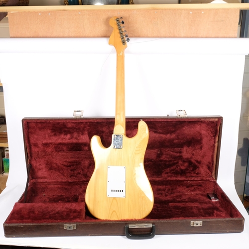 82 - An electric guitar, unnamed with no serial number either, in fitted case