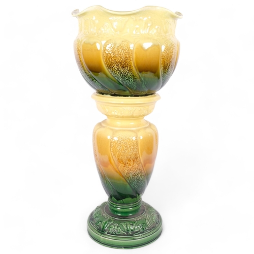 84 - A Melbourne Works Majolica jardiniere on pedestal stand, H67cm