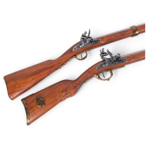 85 - 2 reproduction flintlock rifles, 1 with bayonet