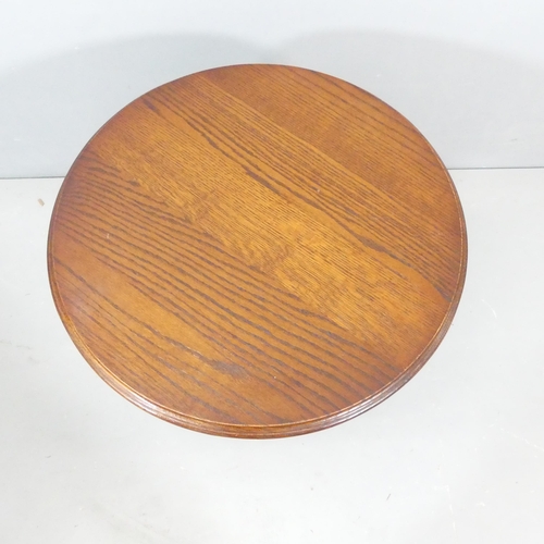 2276 - An oak circular-topped occasional table. 56x60cm, and a French oak pot cupboard. 48x60x34cm. (2)