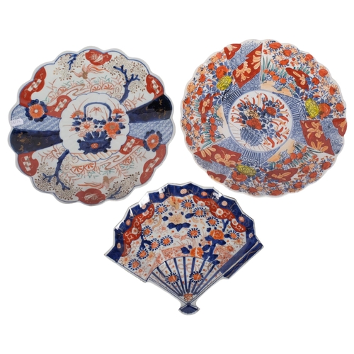 934 - 2 large Imari chargers, largest 32cm, and a Imari decorated fan serving dish (3)