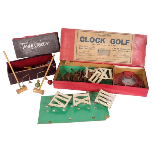 967 - Early 20th century clock golf set, boxed, and a boxed table croquet game (2)