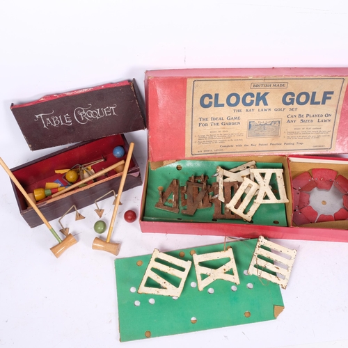 967 - Early 20th century clock golf set, boxed, and a boxed table croquet game (2)