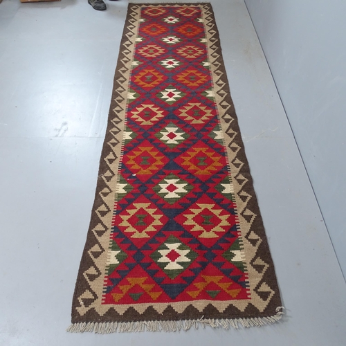 2303 - A Maimana Kilim runner, 304x82cm.