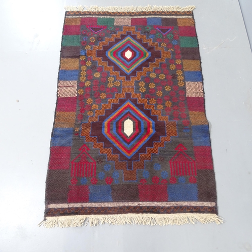 2306 - A multi-coloured Baluchi rug, 132x90cm.