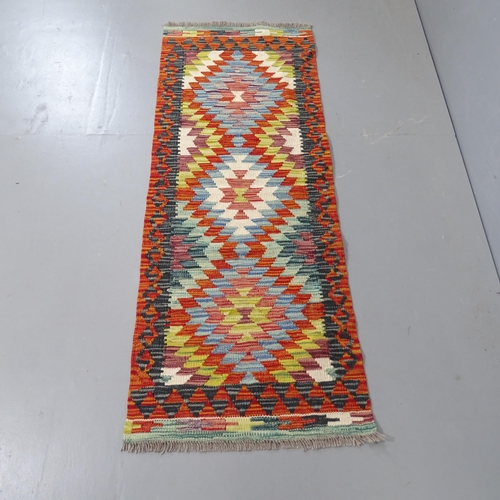 2311 - An orange ground chobi kilim runner, 157x58cm.