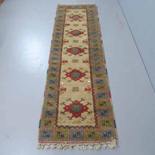 2322 - A cream ground Kazak runner, 270x80cm.