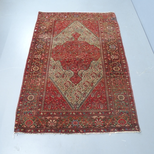 2325 - A red ground Isfahan carpet, 195x130cm.