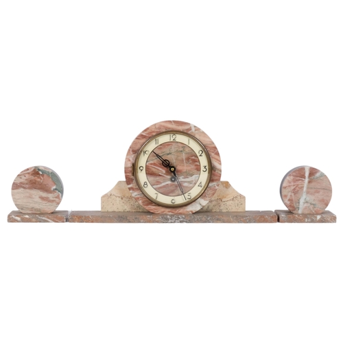 21 - An Art Deco coloured marble clock garniture set, L42cm