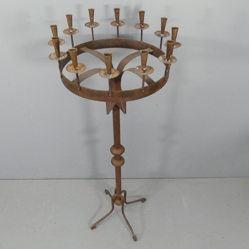 2271 - A Gothic style wrought iron floor-standing candelabra. 50x156cm.