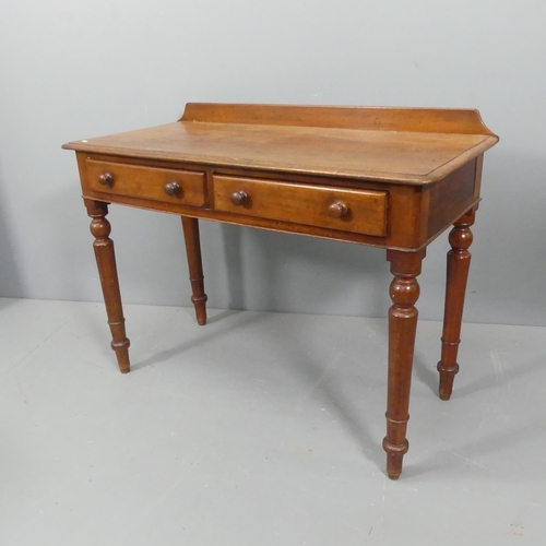 2277 - A Victorian mahogany writing table, with raised back, two frieze drawers and raised on turned legs. ... 